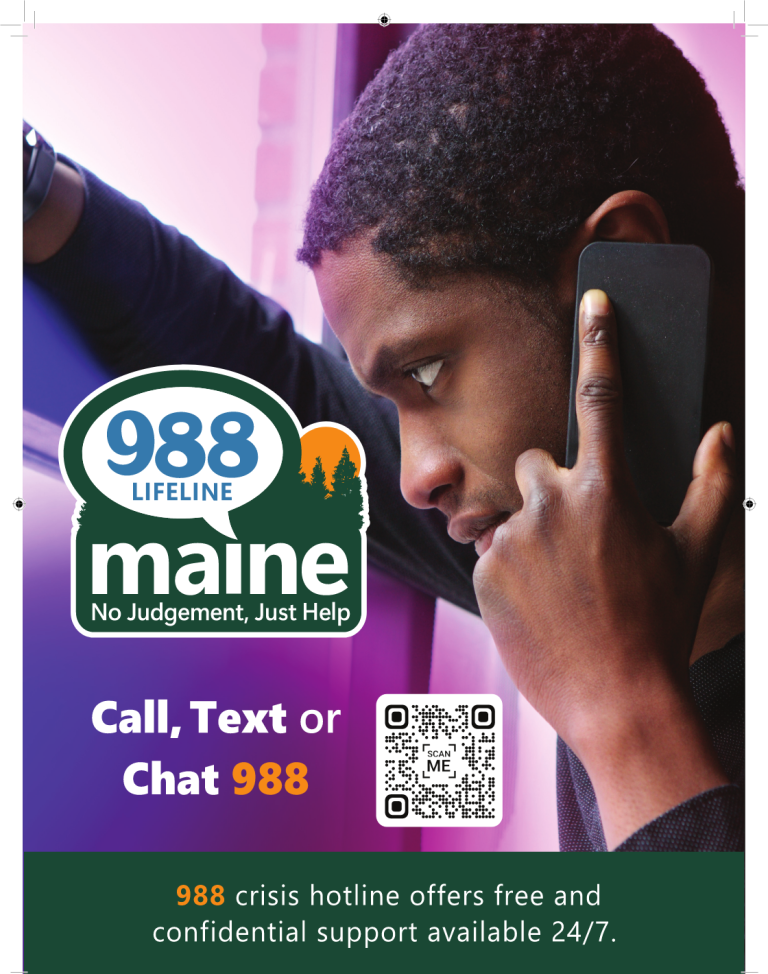 A man talking on a cellphone gazing downward